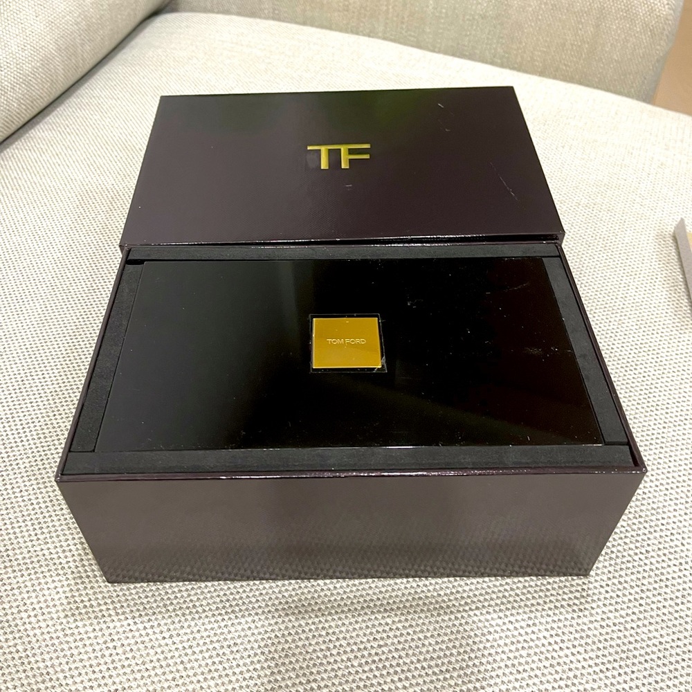 Empty Tom Ford lips and boys box